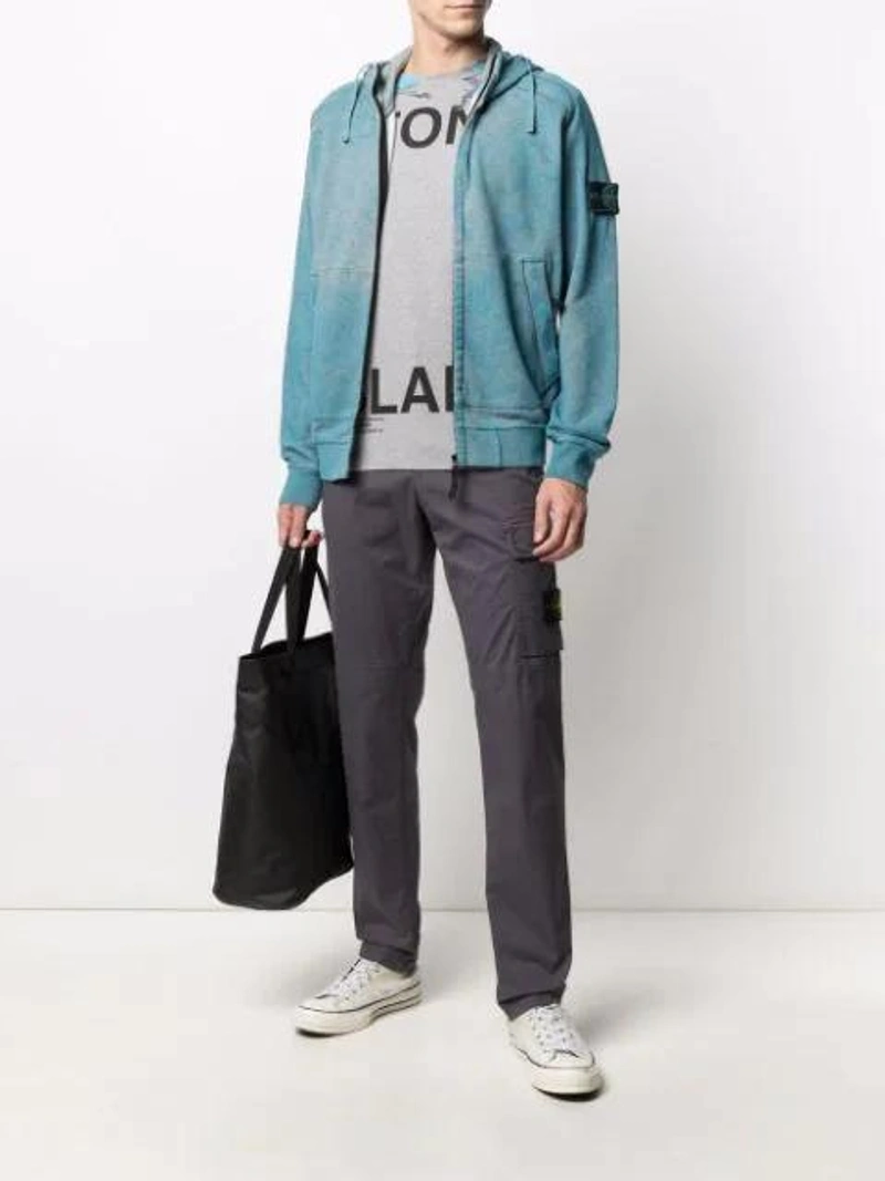 Farfetch's Post | Wearing: Stone Island Dust-detail Zipped Hoodie In Blue; Stone Island Graphic Logo-print T-shirt In Grey