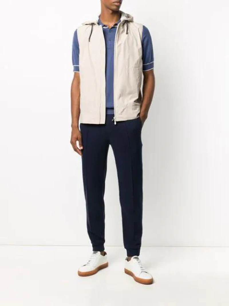 Farfetch's Post | Wearing: Brunello Cucinelli Drawstring Waist Trousers In Blue; Brunello Cucinelli Classic Crewneck T In White; Brunello Cucinelli Jersey Polo Shirt In Blue