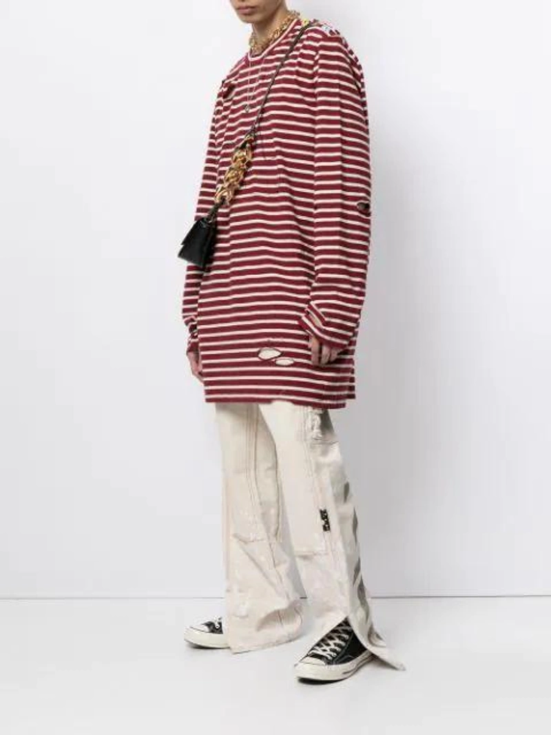 Farfetch's Post | Wearing: Converse 1970s Chuck Taylor All Star Canvas High-top Sneakers In Black; Cool Tm Sailor Oversize Striped Cotton T-shirt In Red,white; Off-white Neutrals X Browns 50 Carpenter Loose Trousers