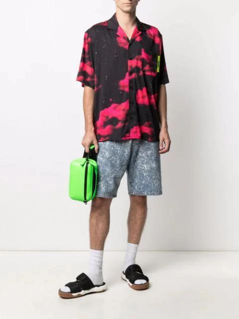 Farfetch's Post | Wearing: Mumofsix Barrow Graphic-print Shirt In Black; 3x1 Claudia Denim Bermuda Shorts In Blau; Prada Fluo Clutch In Yellow/orange