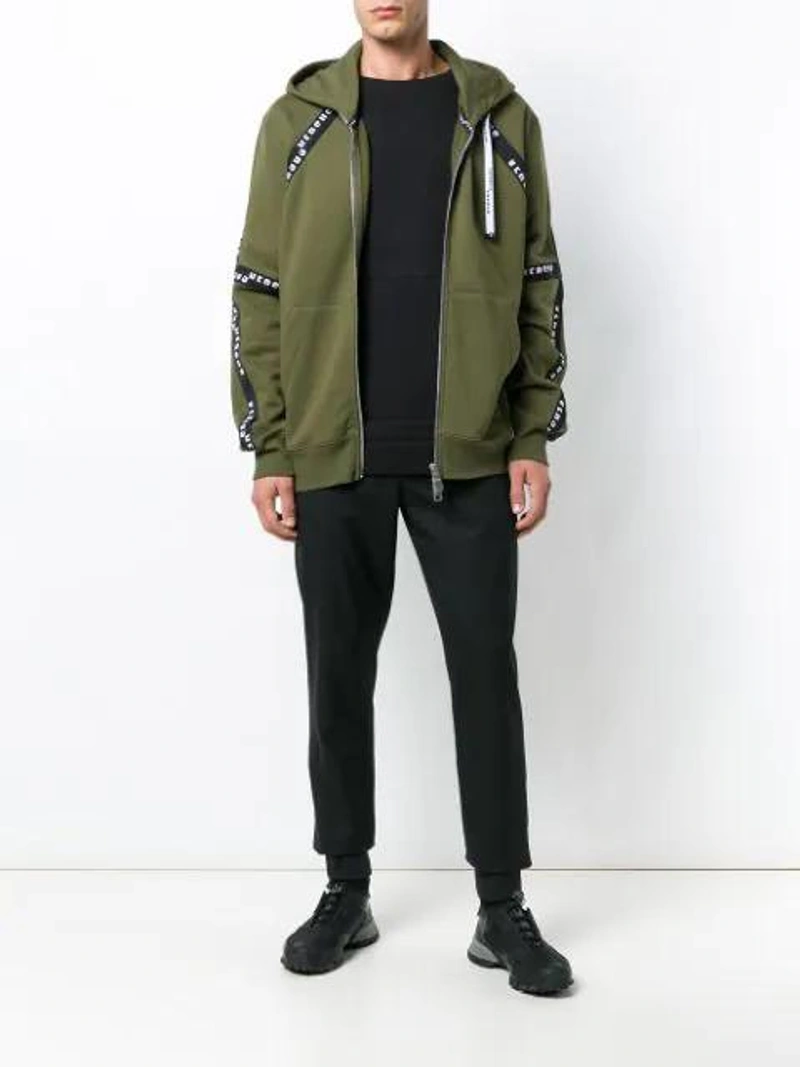 Farfetch's Post | Wearing: Versus Logo Band Zip-up Hoodie In Green; Alexander Mcqueen Skull Knitted Socks; Ps By Paul Smith Elasticated Trousers