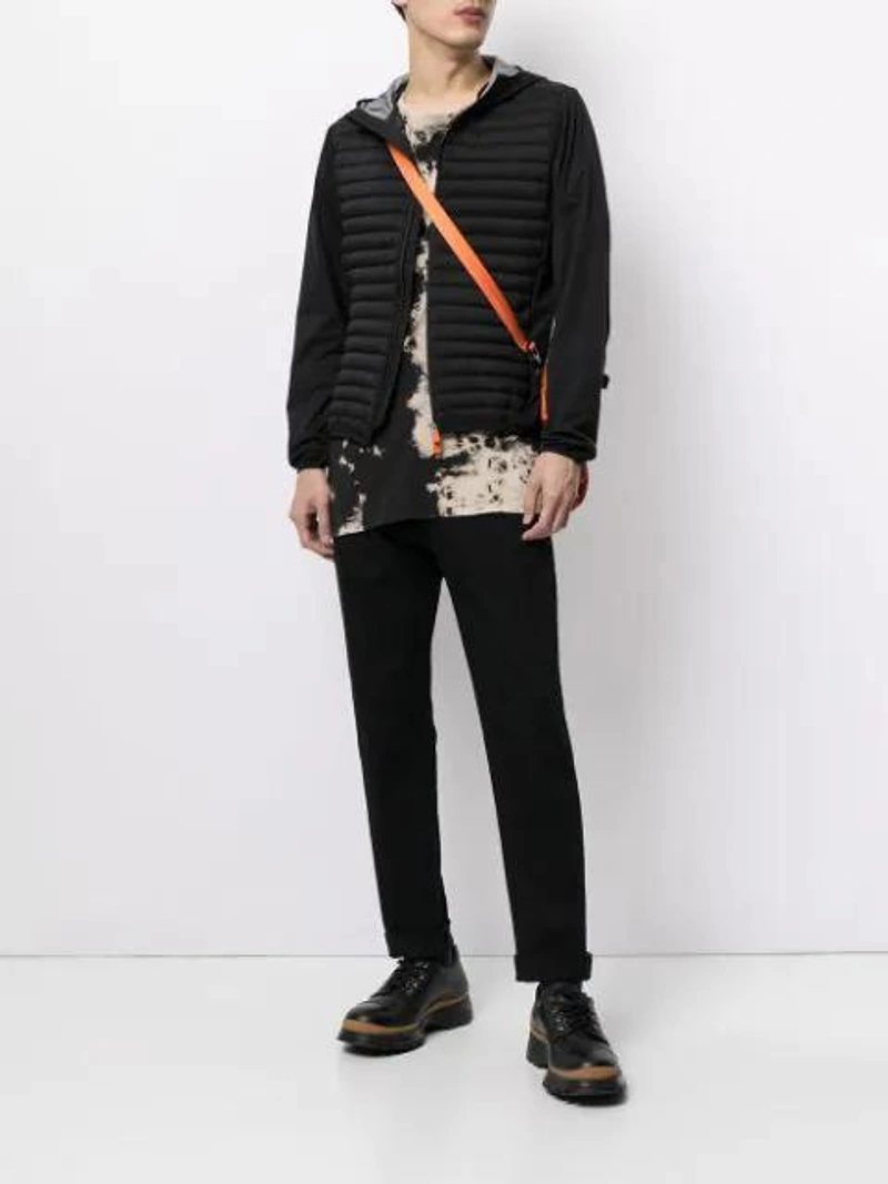 Farfetch's Post | Wearing: Save The Duck Hooded Padded Jacket In Black; Cmmn Swdn Tie-dyed Logo Print T-shirt In Brown; C.p. Company Schultertasche In Satinoptik In Orange