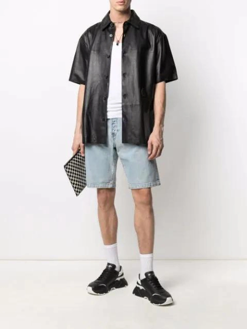 Farfetch's Post | Wearing: Dolce & Gabbana Dolce And Gabbana Black And White Daymaster Sneakers; Trussardi Short Sleeved Shirt In Black Leather; Wardrobe.nyc X Levi's Release 04 Denim Shorts In Blue