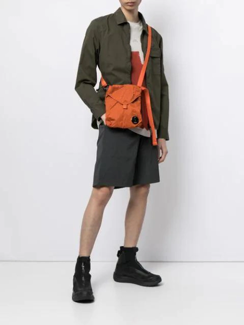 Farfetch's Post | Wearing: A-cold-wall* A-cold-wall Block Painted T-shirt In Multicolor; Gramicci Cordura Shorts In Black; C.p. Company Sleeve Pocket Zipped Shirt-jacket In Green