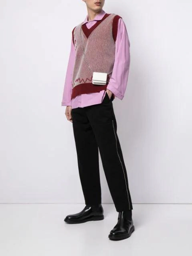 Farfetch's Post | Wearing: Tekla Unisex Organic Cotton Poplin Small Pyjama Top - Purple Pink; Namacheko Striped-pattern Knit Jumper Waistcoat In Red; Namacheko Contrast-stitch Tailored Trousers In Black