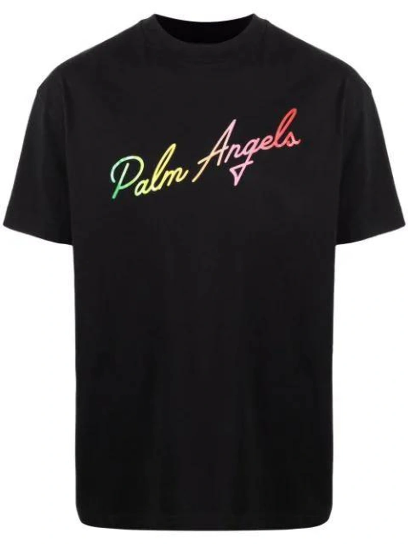 Farfetch's Post | Wearing: Palm Angels Black Multicolor Logo T-shirt; Palm Angels Khaki Camo Curved Logo Lounge Shorts In Green; Anonymous Ism Black And Beige Ribbed Socks Set