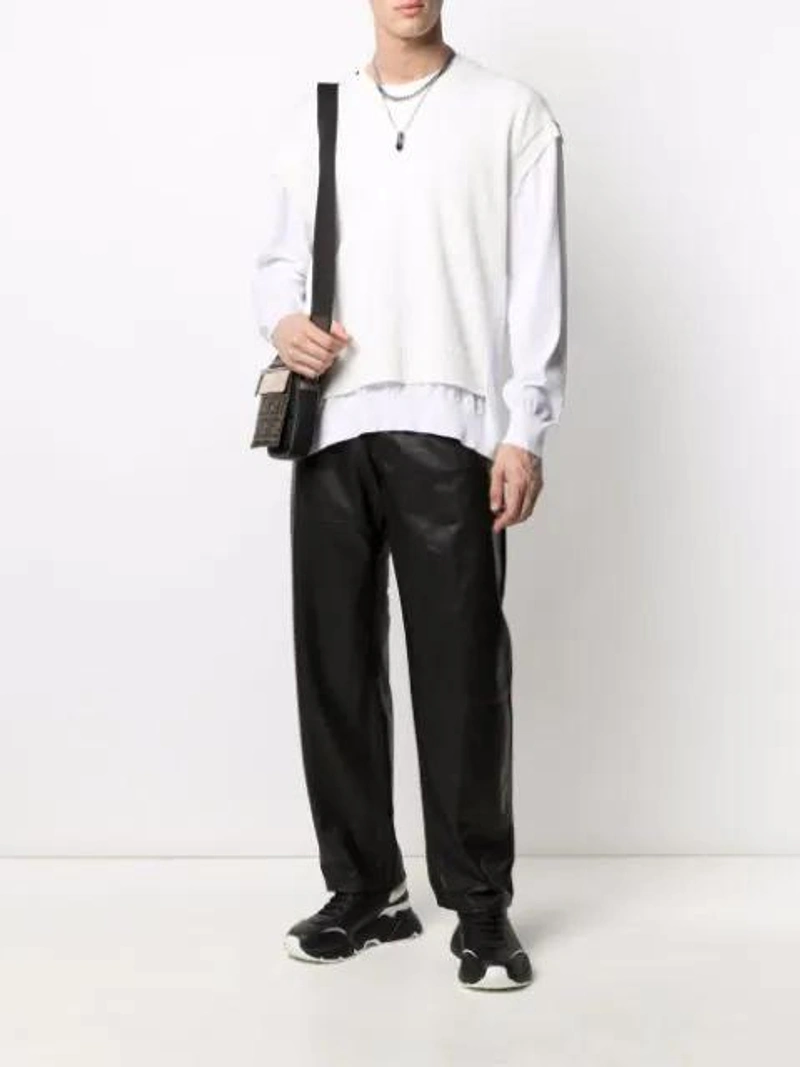 Farfetch's Post | Wearing: Dolce & Gabbana Dolce And Gabbana Black And White Daymaster Sneakers In Black White; Dolce & Gabbana Layered Knitted Jumper In White; Trussardi Straight-leg Leather Trousers In Black