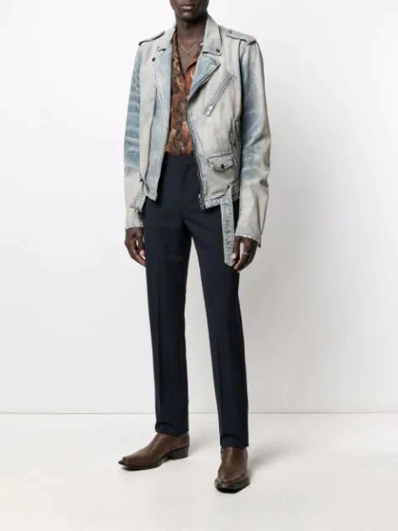 Farfetch's Post | Wearing: Amiri Zip-up Denim Biker Jacket In Blue; Nanushka Brown Ville Amfora Print Bowling Shirt; Emanuele Bicocchi Skull Chain Necklace In Silver