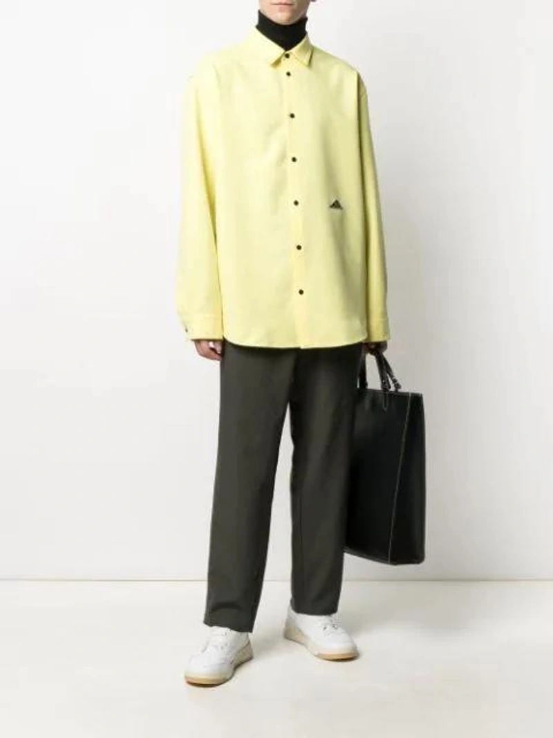 Farfetch's Post | Wearing: Oamc Elasticated Drop-crotch Trousers In Green; Ermenegildo Zegna Roll Neck Wool Sweater In Black; Oamc Long-sleeve Shirt In Yellow