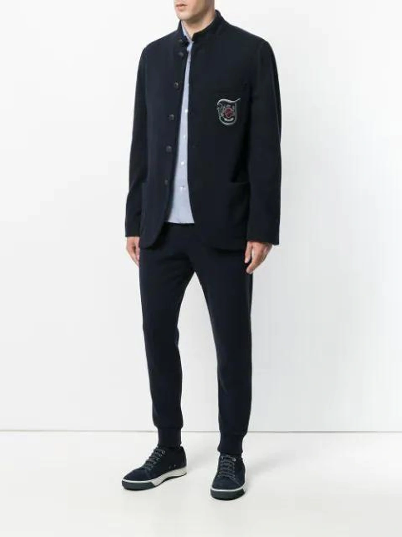 Farfetch's Post | Wearing: Jo No Fui Logo Patch Shirt In Blue; Jo No Fui Logo Patch Trousers In Blue; Jo No Fui Logo Patch Jacket In Blue