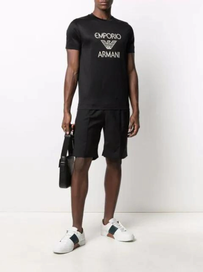 Farfetch's Post | Wearing: Emporio Armani Logo-print Cotton T-shirt In Black; Y-3 Black Classic Logo Shorts; Hugo Boss Black Leather Cross Body Bag