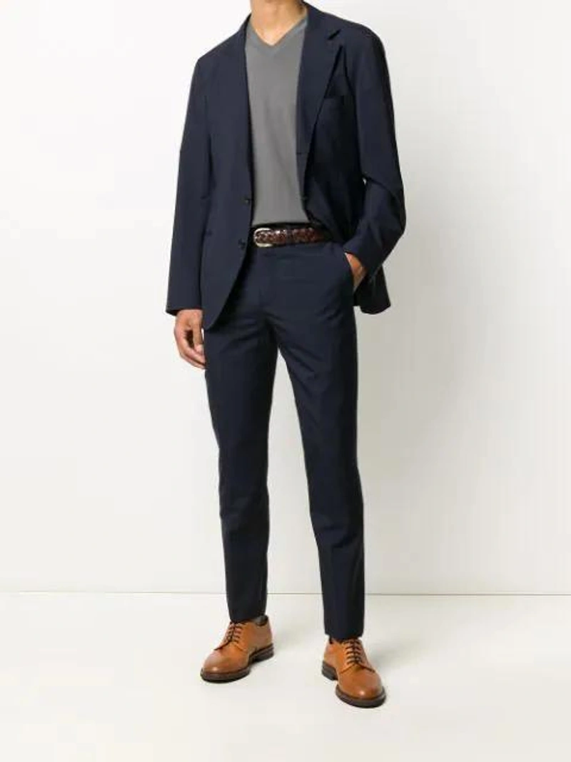 Farfetch's Post | Wearing: Brunello Cucinelli Tapered Leg Tailored Trousers In Blue; Brunello Cucinelli Men's Travel Wool & Silk Three-button Blazer In Navy