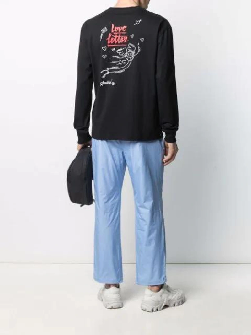 Farfetch's Post | Wearing: Soulland Pepe Long-sleeved Organic Cotton T-shirt In Black; A-cold-wall* Logo Patch Belt Bag In Black; Off-white Omri008f20pla0016003 Square-frame Sunglasses In Black