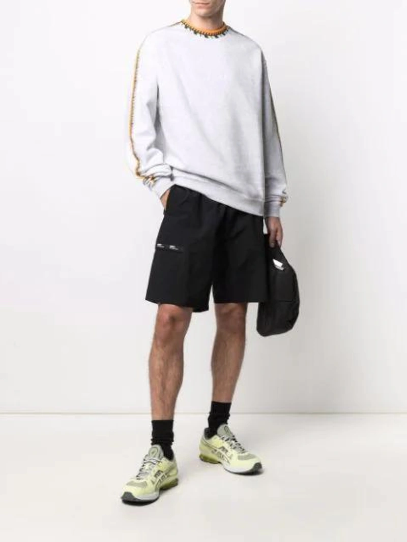 Farfetch's Post | Wearing: Adidas Originals Rib-detail Long-sleeved Jumper In Grey; A-cold-wall* Logo Patch Belt Bag In Black; Asics Yellow Gel-kinsei Og Sneakers