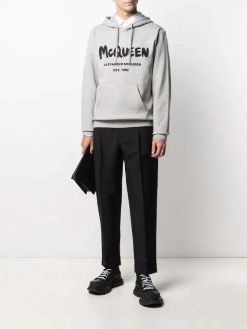 Farfetch's Post | Wearing: Alexander Mcqueen Logo-print Hoodie In Grey; Alexander Mcqueen Chunky High-top Sneakers In Black; Hugo Jango Cotton Shirt In White