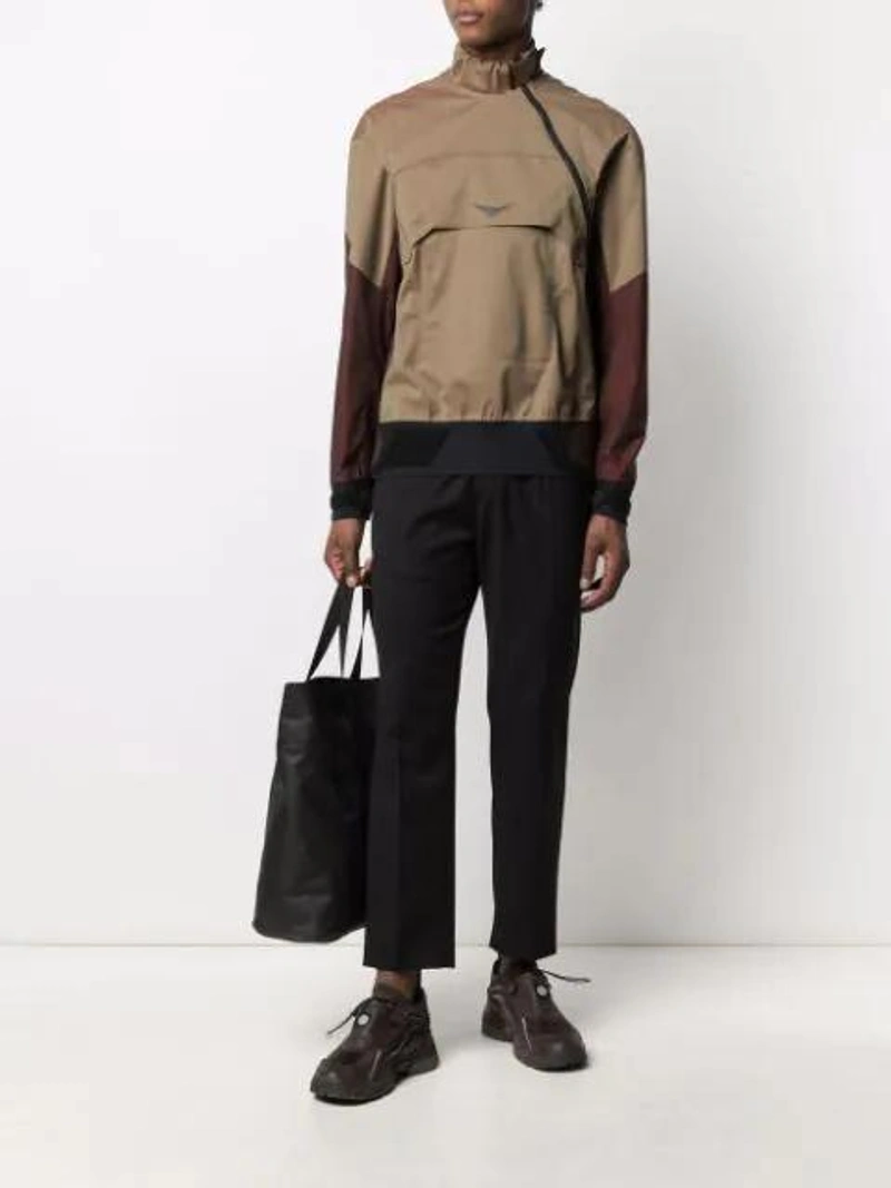 Farfetch's Post | Wearing: Sease Two-tone Windbreaker Jacket In Neutrals; Cmmn Swdn Tapered Drawstring Trousers In Black; Arc'teryx Granville Waterproof Tote Bag In Black