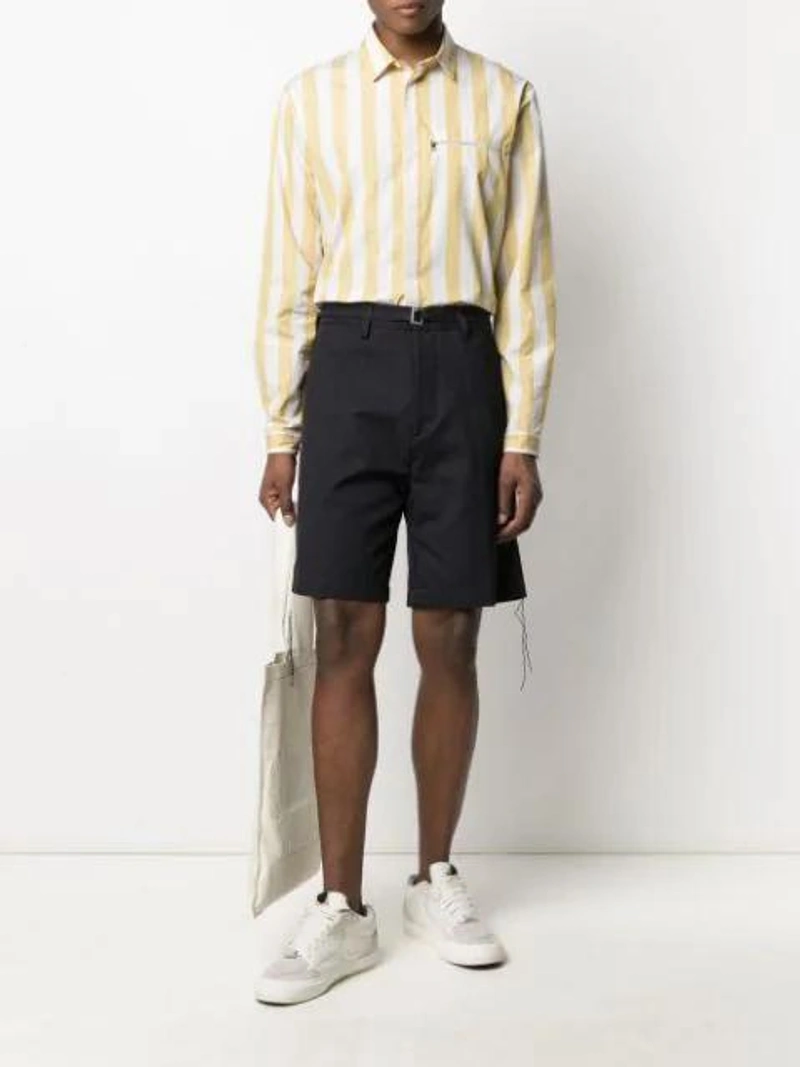 Farfetch's Post | Wearing: Haikure Mason Belted Waist Shorts In Blue; Sunnei Vertical-stripe Long-sleeve Shirt In Yellow; Marni Colour Block Crossbody Bag In 绿色