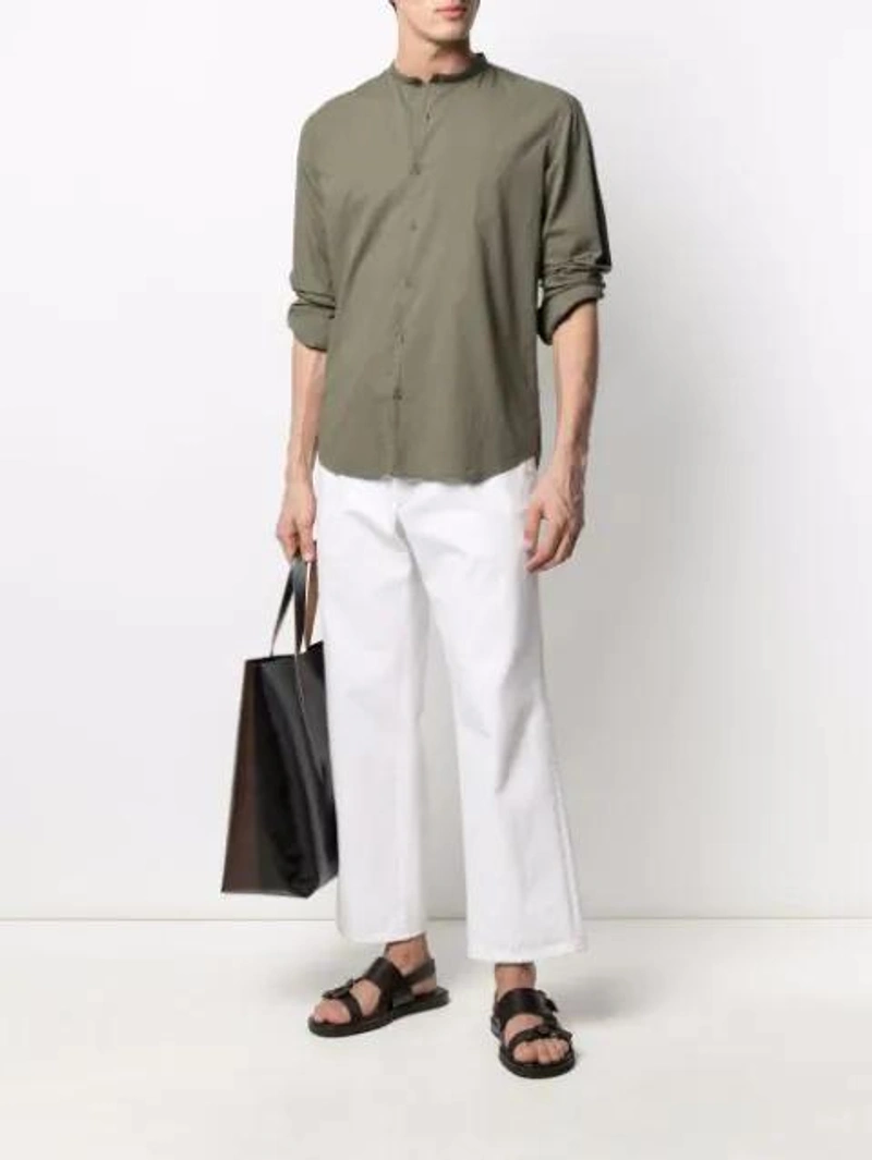 Farfetch's Post | Wearing: Costumein Domenico Bangui Band-collar Shirt In Green; Prada Cropped Straight-leg Jeans In White; Apc Logo-print Leather Messenger Bag In Brown