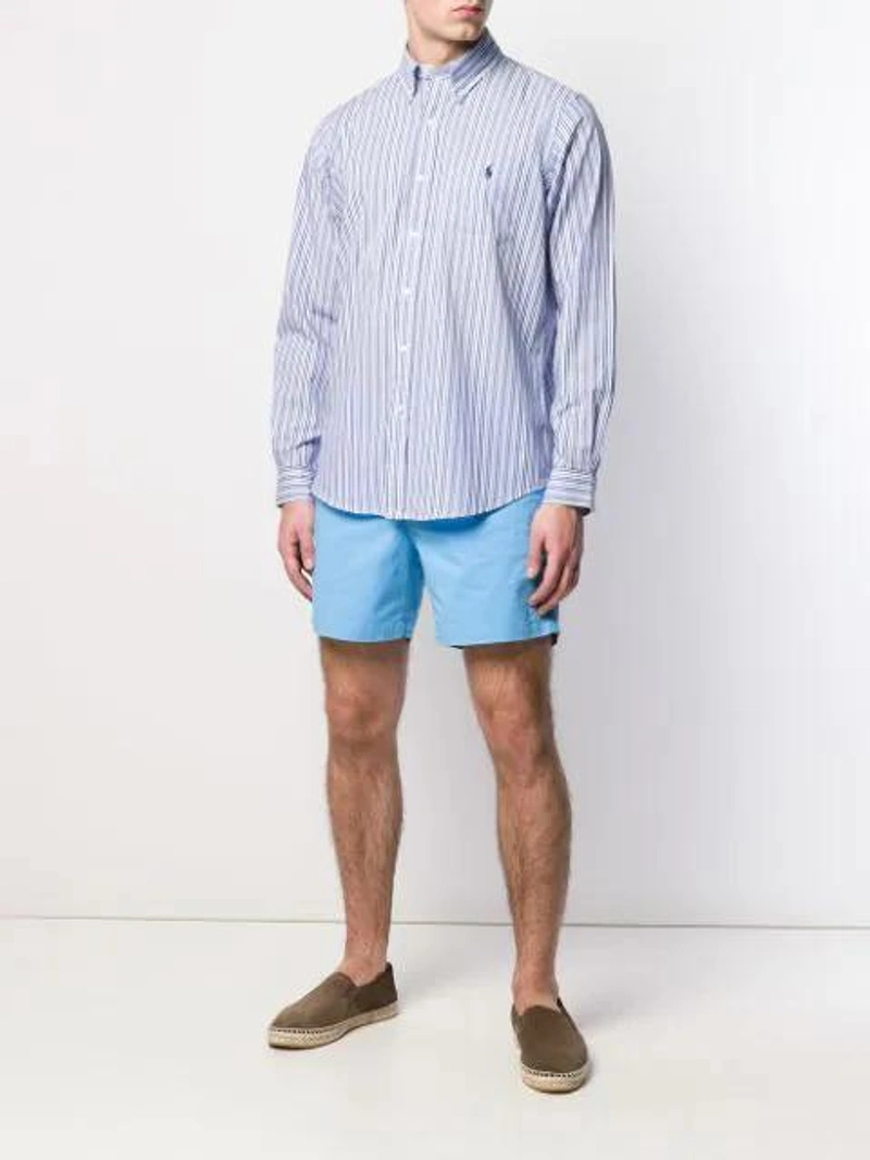 Farfetch's Post | Wearing: Polo Ralph Lauren Elasticated Waistband Shorts In Blue Lagoon; Polo Ralph Lauren Striped Button Down Shirt In Blue