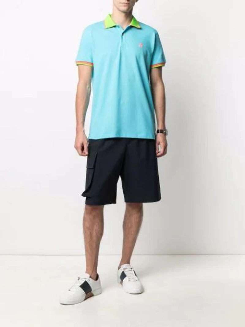 Farfetch's Post | Wearing: Peuterey Contrasting Edges Polo Shirt In Light Blue; Joseph Techno Wool Shorts In Blue; Bering Classic Polished 40mm Watch In Blue