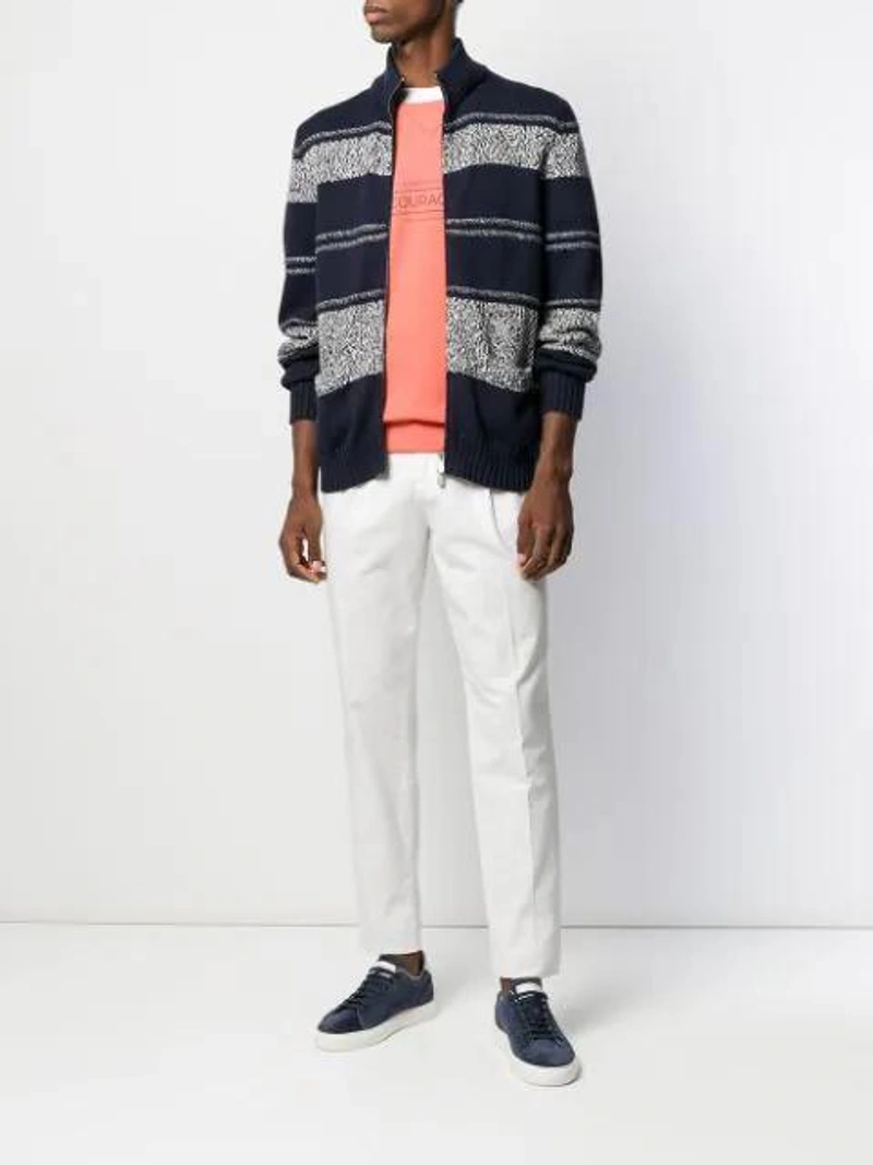 Farfetch's Post | Wearing: Brunello Cucinelli Be Courageous T-shirt In Orange; Brunello Cucinelli Striped Pattern Cardigan In Blue; Brunello Cucinelli Colour Block Chinos In White