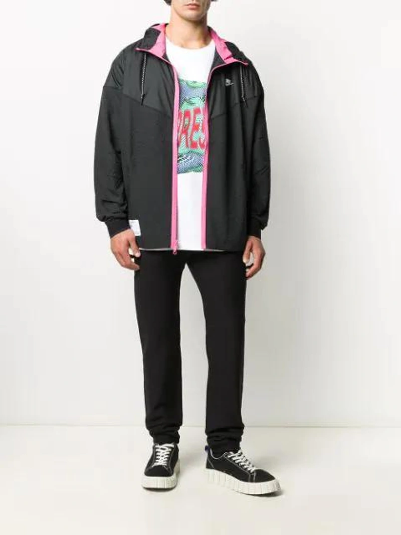 Farfetch's Post | Wearing: Nike Reversible Hooded Jacket In Black; Heron Preston White X Homecoming Logo Cotton T-shirt In 白色; Heron Preston Ctnb Logo Patch Belt Bag In Orange
