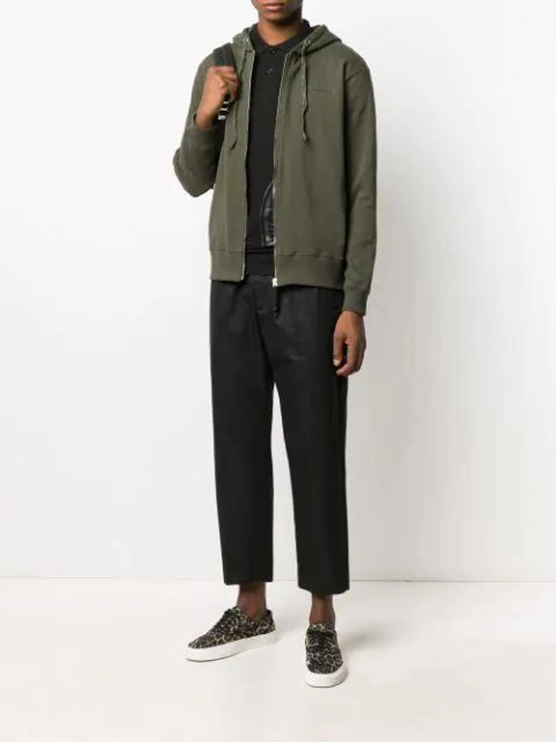 Farfetch's Post | Wearing: John Richmond Maruski Zip-front Hoodie In Green; Jil Sander Wide-leg Tailored Trousers In Blue; Prada 经典标志牌背包 - 黑色