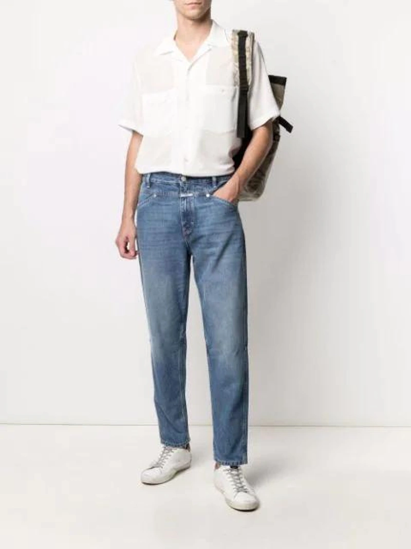 Farfetch's Post | Wearing: Emanuele Bicocchi Curb Braided Bracelet In Silver; Closed X-lent Relaxed Tapered Leg Cropped Jeans In Mid Blue; C.p. Company Green Nylon Messenger Bag