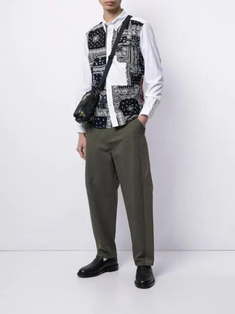 Farfetch's Post | Wearing: Sophnet Bandana-print Button-up Shirt In Blue; Off-white Reverse Logo Sport Socks; Valentino Baggy-fit Panelled Trousers In Green