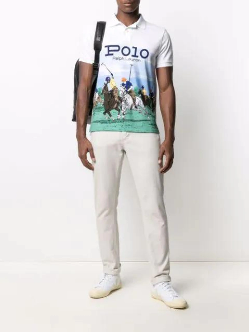 Farfetch's Post | Wearing: Polo Ralph Lauren Graphic Print Cotton-piqué Polo Shirt In White; Neuw Lou Slim-leg Jeans In White; Calvin Klein Round Backpack In Black