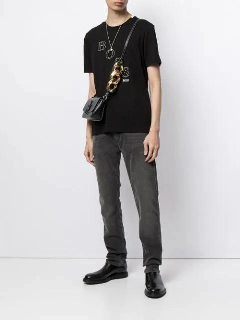 Farfetch's Post | Wearing: Tom Wood Metallic Coin Pendant Sterling Silver Necklace; Hugo Logo Print T-shirt In Black; Jw Anderson Black Nano Anchor Leather Cross Body Bag