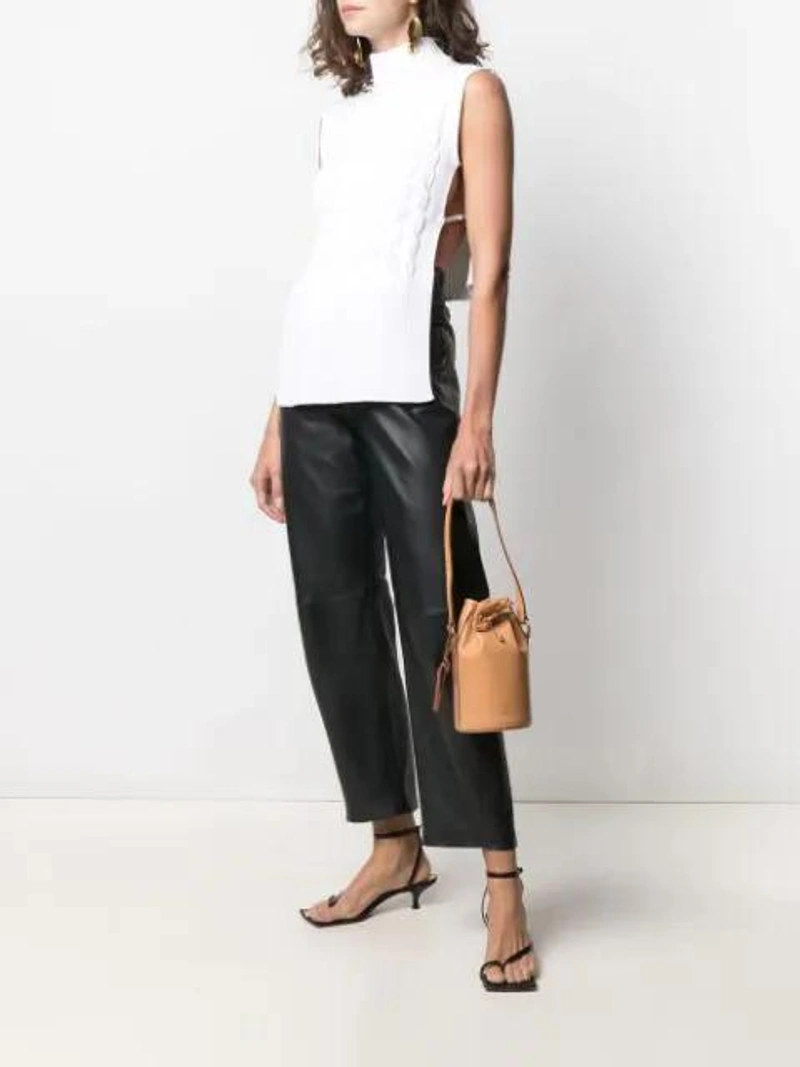 Farfetch's Post | Wearing: Sportmax Stampa Knitted Vest In White; Pre-owned Louis Vuitton Special Edition  Champagne Bottle Holder In Brown