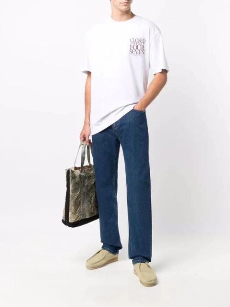 Farfetch's Post | Wearing: Closed Logo Crew-neck T-shirt In 白色; Closed Straight-leg Organic Cotton Jeans In Blue; Stone Island 'burnout' Shopper In Green