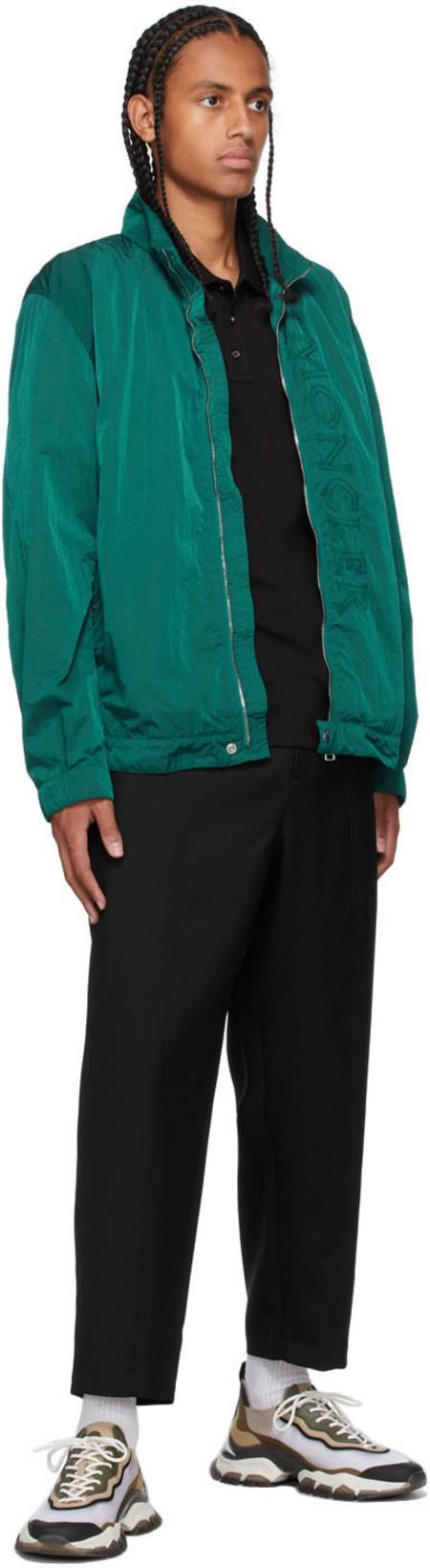 MONCLER This Polo Shirt Features A Timeless Design That Transcends The Seasons In Black