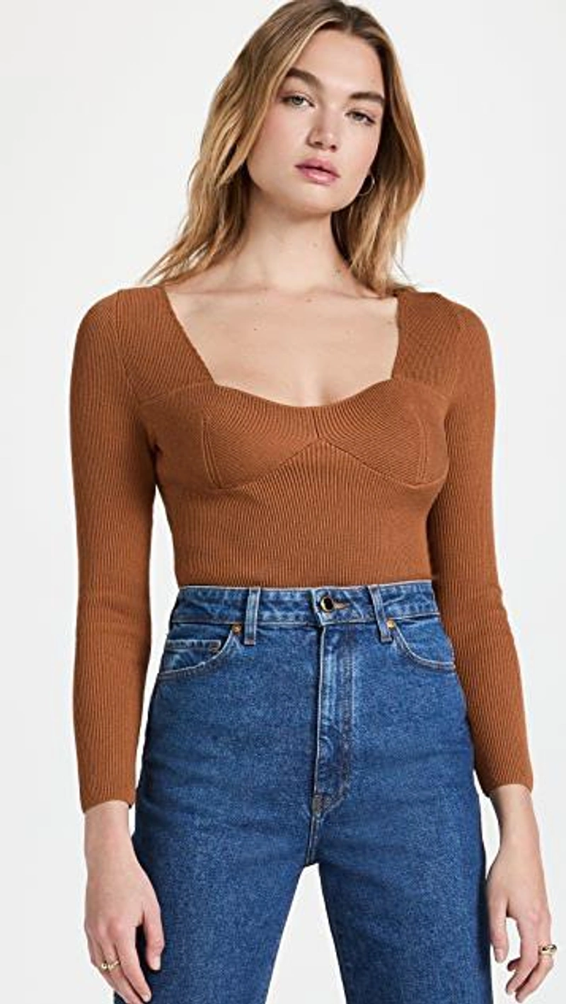 shopbop.com's Posts | 搭配: Khaite Daniella High-waisted Denim Jeans In 069 Montgomery Stretch；Sokie Collective Constructed Sweater In Camel；Shashi Timeless Hoops In Gold