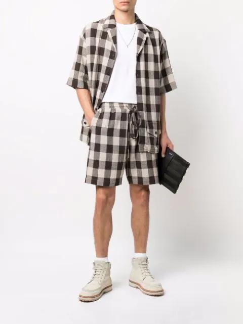 MISMO Woven Clutch Bag In Black