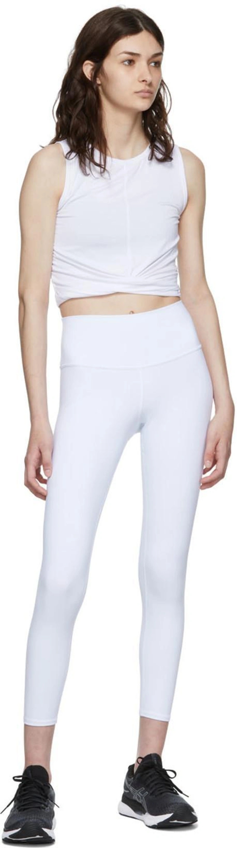 SSENSE's Post | 搭配: Alo Yoga White Nylon Sport Leggings；Alo Yoga White Rayon Sport Top；Alo Yoga Black Nylon Sport Bra