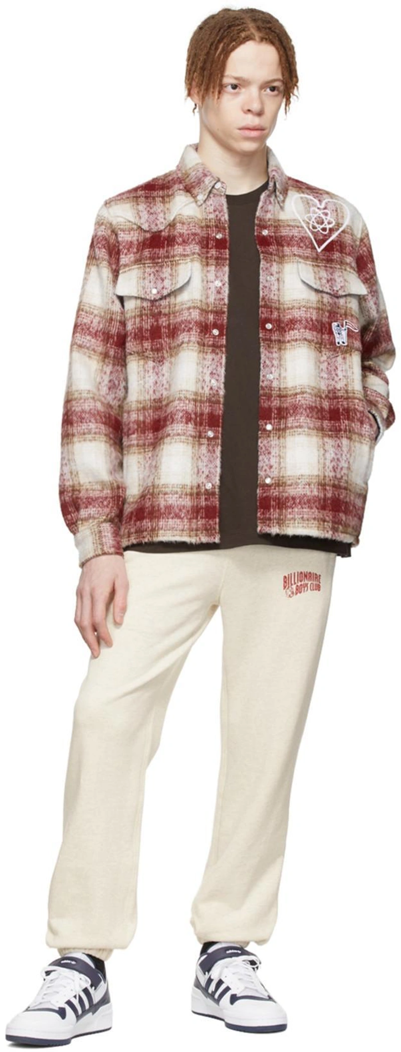 SSENSE's Post | 搭配: Billionaire Boys Club Logo-embroidered Check Flannel Overshirt In Red；Billionaire Boys Club Beige Cotton Lounge Pants In Oat；Billionaire Boys Club Brown Cotton T-shirt