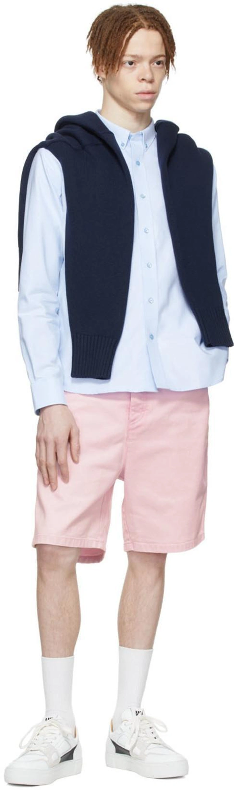 SSENSE's Post | Wearing: Ami Alexandre Mattiussi Pink Alex Shorts In Pale Pink/655; Ami Alexandre Mattiussi Blue Ami De Cœur Shirt In Sky Blue/450; Ami Alexandre Mattiussi Ami De Coeur Low-top Sneakers In White