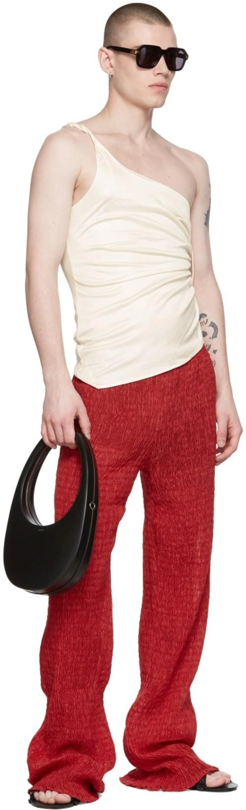 SSENSE's Post | 搭配: Ludovic De Saint Sernin Red Cloud-d Lounge Pants；Ludovic De Saint Sernin One-shoulder Asymmetrical Top In White；Coperni Ssense Exclusive Black Swipe Bag