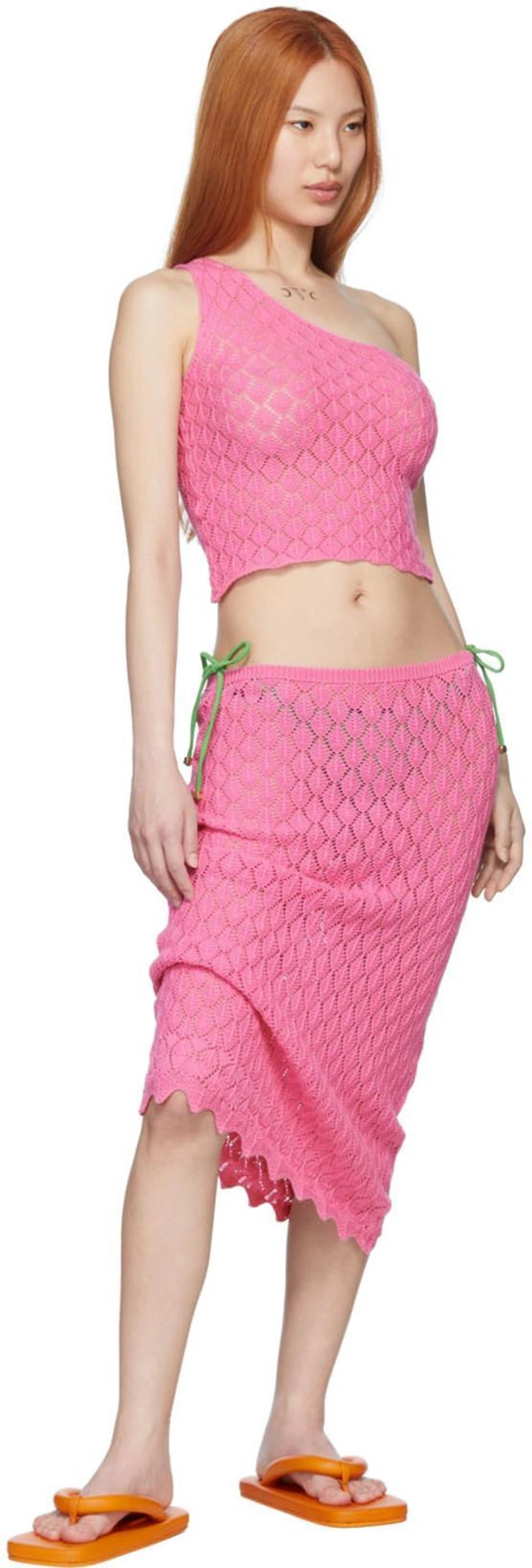 SSENSE's Post | 搭配: Nanushka 侧系带比基尼三角裤 In Green；Gimaguas Pink Isola Midi Skirt；Gimaguas Pink Isola Tank Top