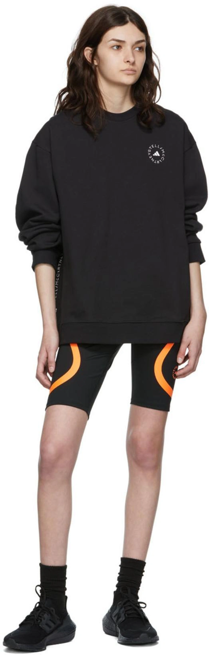 SSENSE's Post | Wearing: Adidas Originals Ultraboost 21 Primeblue Trainers In Black; Adidas By Stella Mccartney Black Recycled Polyester Sport Shorts; Adidas By Stella Mccartney Logo Print Training Sweatshirt In Black