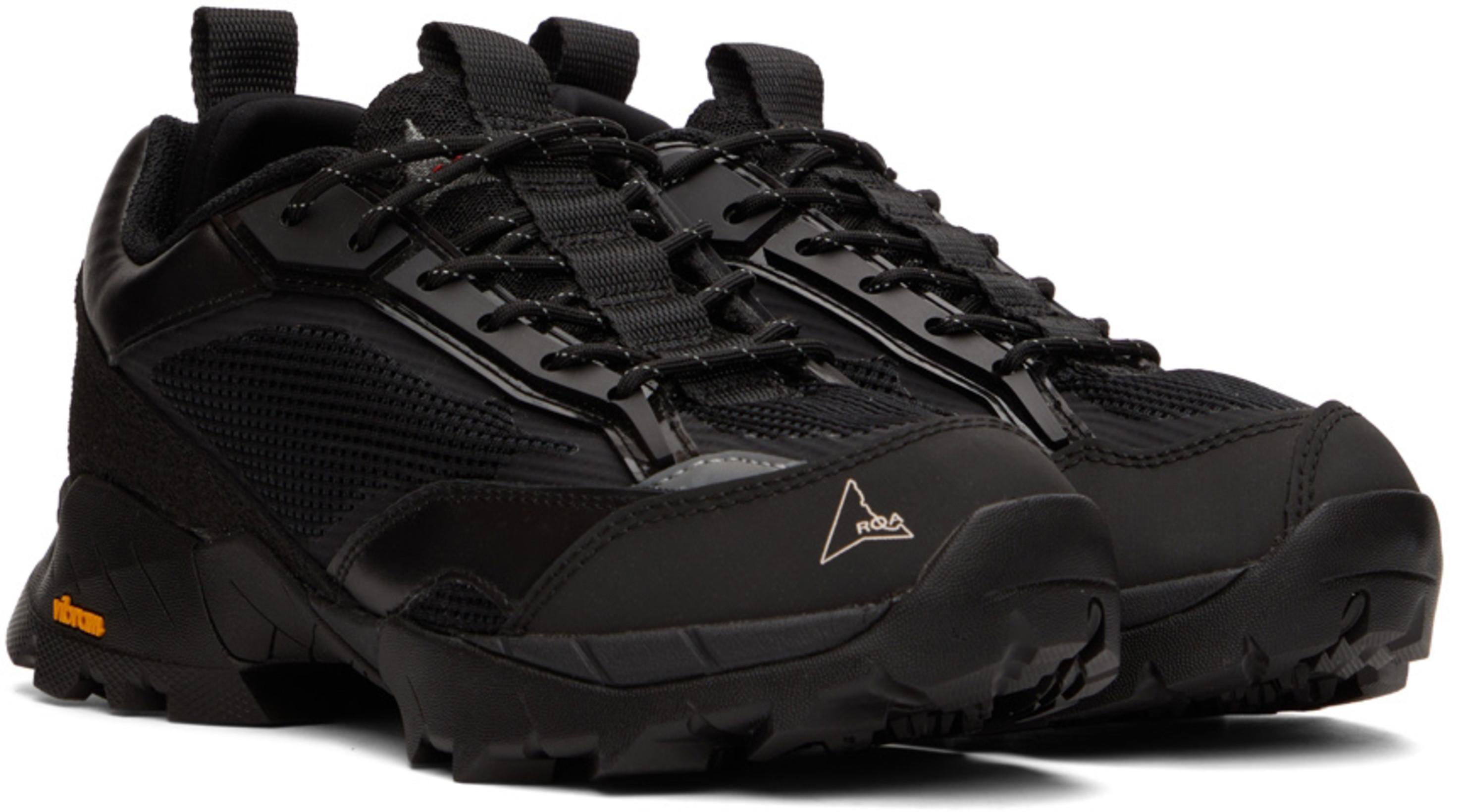 ARNAR MAR JONSSON Hraun Contrast-pocket Relaxed Fit Shell Shorts In Black