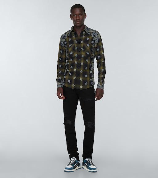 AMIRI Distressed Slim Fit Jeans In Black