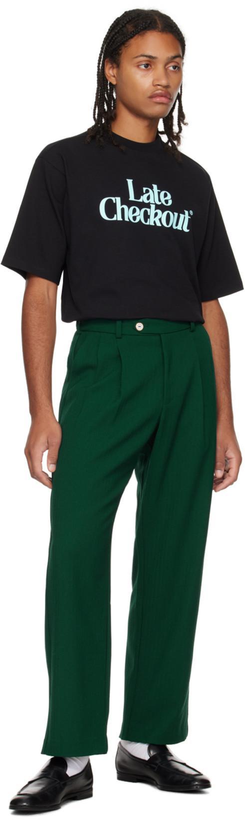 LATE CHECKOUT Green Pleated Trousers In Emerald Green