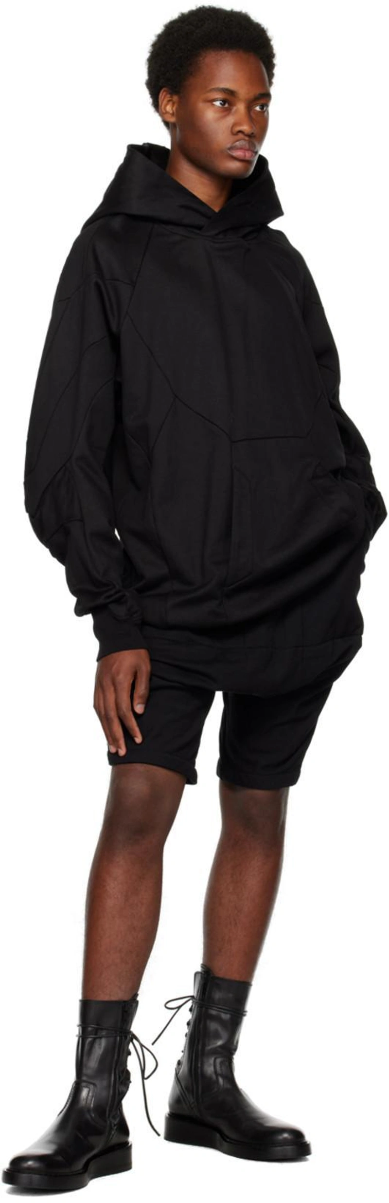 SSENSE's Post | 搭配: Julius 长袖拼接连帽衫 In Black；Julius Sarrouel 垮裤设计短裤 In Black；Ann Demeulemeester Black Victor Boots