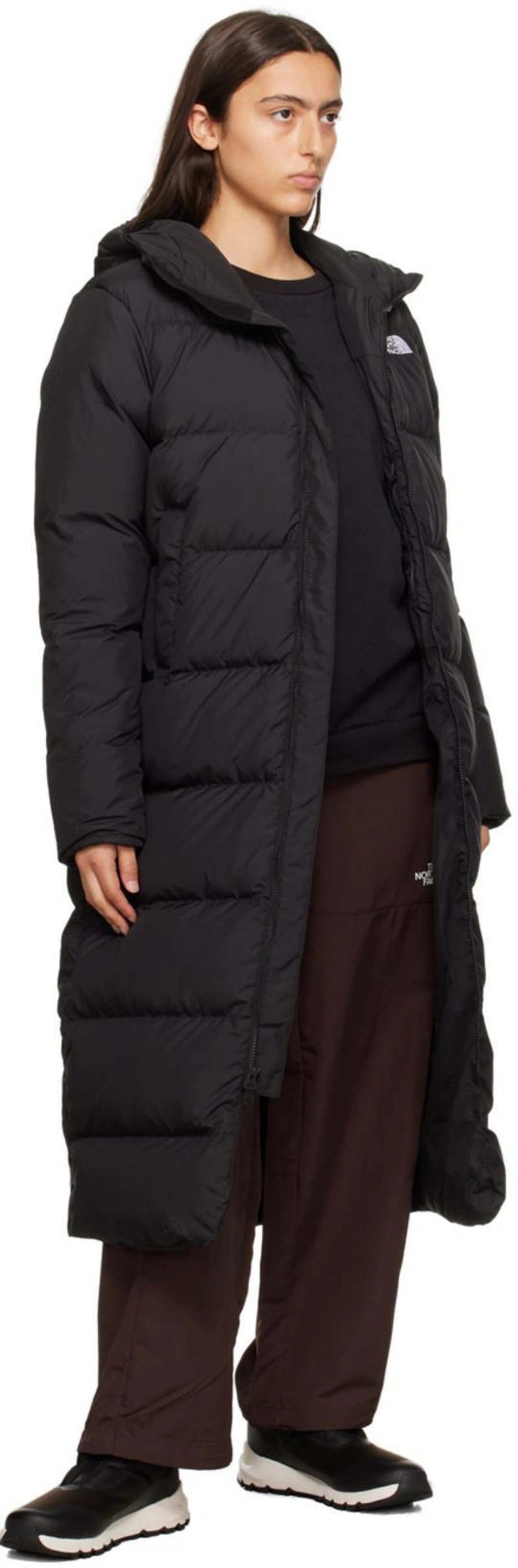 SSENSE's Post | 搭配: The North Face Black Triple C Down Coat；The North Face Black Embroidered Sweatshirt；The North Face Brown Easy Trousers