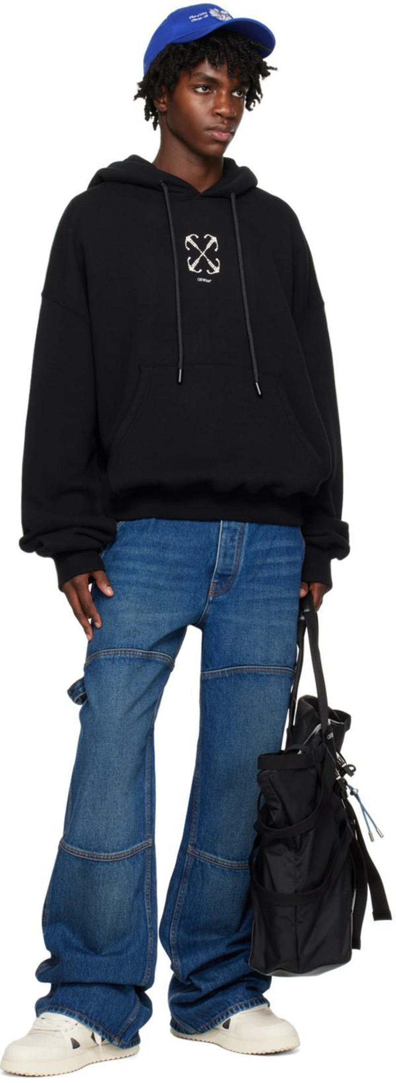 SSENSE's Post | 搭配: Off-white Blue Flare Jeans；Off-white Courrier Oversize Tote Bag In Black；Off-white Blue 'va' Baseball Cap In Dark Blue White