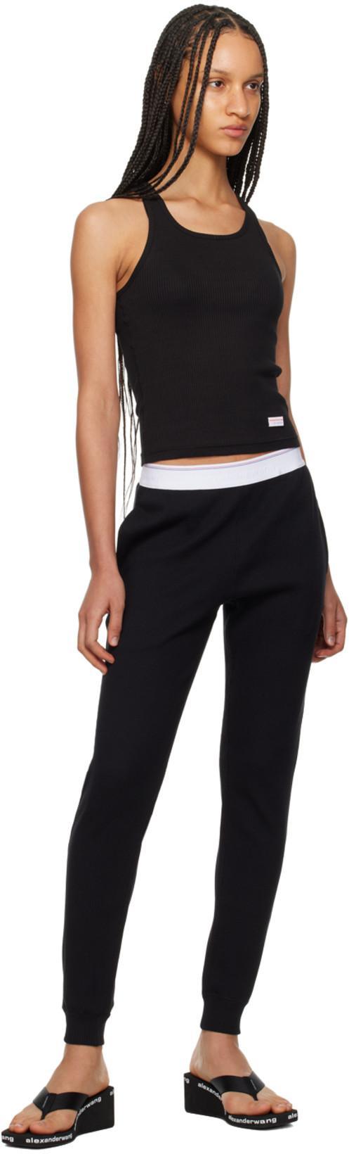 ALEXANDER WANG Square Toe Logo Midsole Wedged Flip Flops In Black