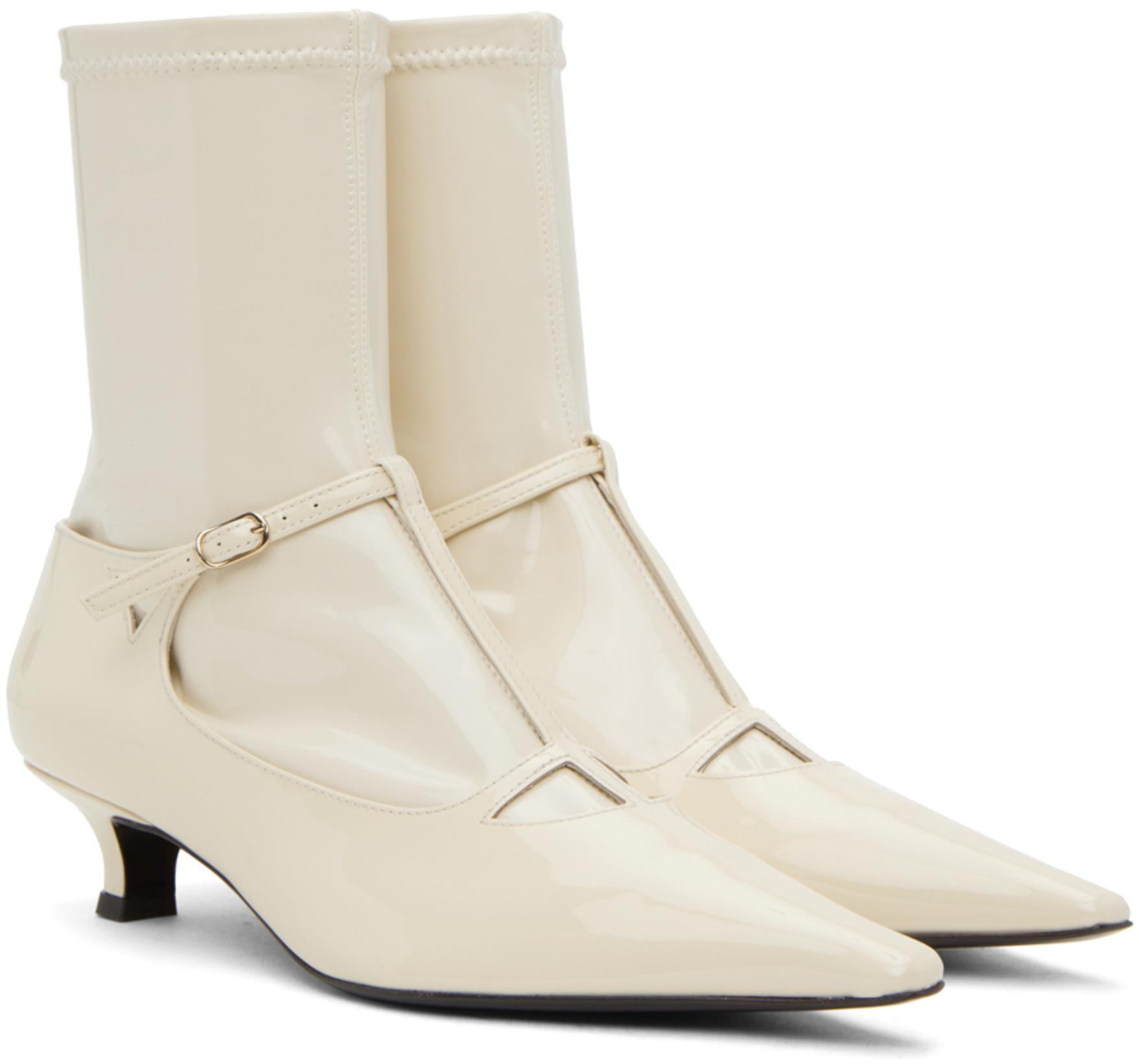 THE ROW Cyd Patent T-strap Booties In Vanilla
